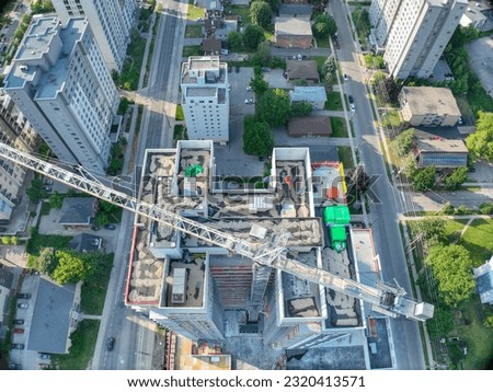 Aerial View of New Building Construction including crane, Urban City, Drone Photo, 