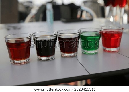Different Kinds of Ginja Portuguese Liqueur from Aguardente Brandy Fortified Wine at a Tasting Royalty-Free Stock Photo #2320415315