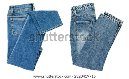 Blue jeans lined in a pile of jeans elements modern women's and men's fashion pants isolated cut-out background - clipping path