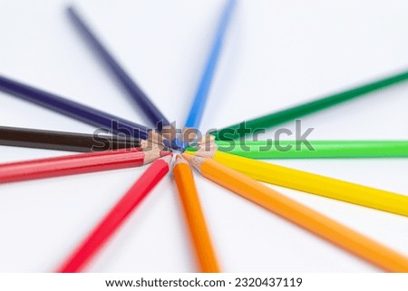 Circle of colored pencils on a white background. colorful and brightness concept. Pride Month. gender diversity. cultural diversity. free space for advertising. backdrop for advertising.