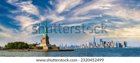 Panorama of  Statue of Liberty against Manhattan cityscape background in New York City, NY, USA Royalty-Free Stock Photo #2320452499
