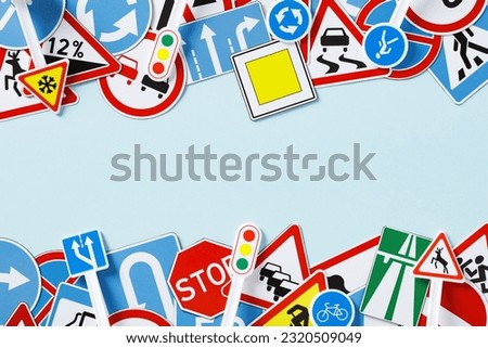 Driving school courses banner template. Frame of road signs on light blue background.