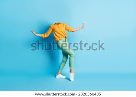 Creative abstract composite photo template collage of unusual weird headless woman dancing enjoy music isolated on blue color background Royalty-Free Stock Photo #2320560435