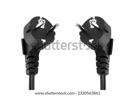 Plug connection from the power supply of a personal computer on a white background. Wire with a plug close-up cut out on a white background. Royalty-Free Stock Photo #2320563861
