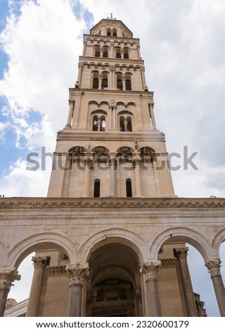 The Romanesque bell tower of the Cathedral of Saint Domnius - Katedrala Svetog Duje - in Split, Croatia. Located within the Diocletian Palace. Seen from Peristil  Royalty-Free Stock Photo #2320600179