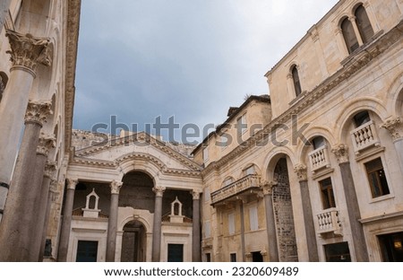 Architecture in Peristil or Peristyle Square, a monumental court within the Diocletian Palace in Split, Croatia. Looking towards the entrance of the Vestibule, also called the Rotonda or the Atrium Royalty-Free Stock Photo #2320609489