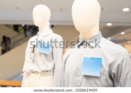 mannequin dressed in casual clothes. shelf display in shop mall store. Store Of Shopping Center.