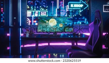 Empty Gaming Station with Computer Screen Showing Fantasy RPG Strategy Video Game. Online eSports Gaming Tournament Live Stream. Monitor on a Table in a Futuristic Cyberpunk Room with Neon Light