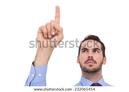 Businessman in shirt pointing something up on white background