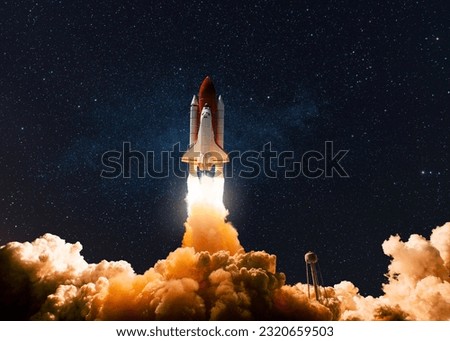 New Ship Rocket Shuttle flies to moon. Spaceship lift off into the starry sky. Rocket starts into space. Concept. Travel to Mars Royalty-Free Stock Photo #2320659503