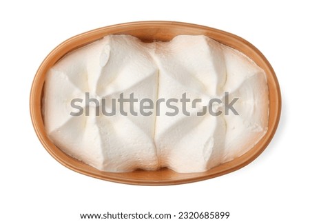 Delicious vanilla ice cream in container isolated on white, top view