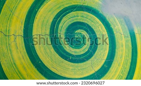 Abstract background A picture of the surface of a marble table with flashy colors. green mix yellow bright and attractive