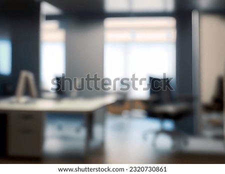 Abstract blurred office interior background. Beautiful blurred background of a light modern office interior with panoramic windows and beautiful lighting. Royalty-Free Stock Photo #2320730861