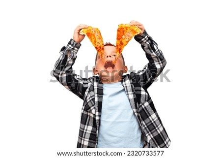 A cute stylish child boy with a red mohawk on his head  holding two pieces of sausage pizza over his open mouth