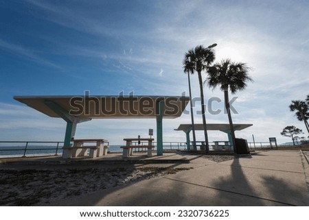 Art deco style sun shade picnic area near Mexico beach in Florida USA