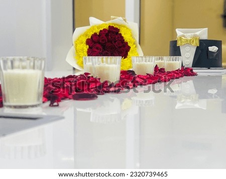 Romantic birthday party celebration for hubby with beautiful sky view nd delicious cake decoration with candles and roses   Royalty-Free Stock Photo #2320739465