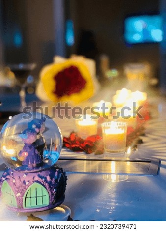 Romantic birthday party celebration for hubby with beautiful sky view nd delicious cake decoration with candles and roses   Royalty-Free Stock Photo #2320739471