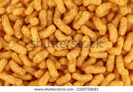 Puffed corn and peanuts snacks. Background and texture, full frame. Royalty-Free Stock Photo #2320758681