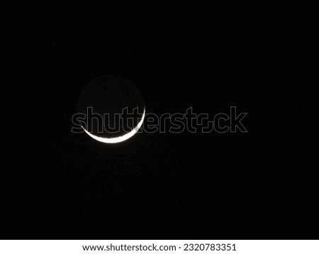 Amazing waning cresent moon with a pale yellow colour which is enhancing the beauty of sky