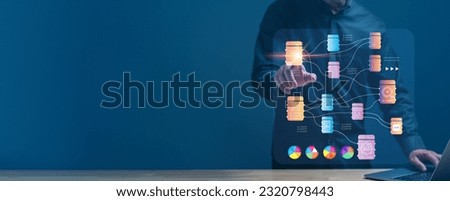 Programmer collaborated with finance, market departments to develop, economic software system that streamlined transaction processes, supported sales, analyzed on shared screen for effective decision Royalty-Free Stock Photo #2320798443