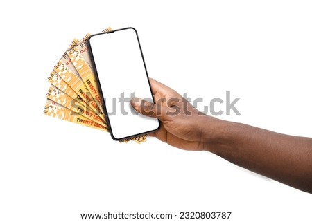 Black hand holding mobile phone with blank screen and Sierra Leonean Leone notes Royalty-Free Stock Photo #2320803787