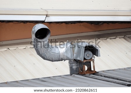 Old Electric Roof Exhaust Duct of Restaurant Kitchen
