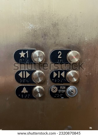 Buttons on an elevator with an oil rub bronze finish