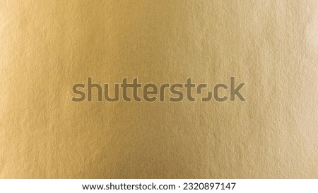 Gradation gold foil leaf shiny matt with sparkle yellow metallic texture background.
Abstract paper glitter golden glossy for template.
top view. Royalty-Free Stock Photo #2320897147