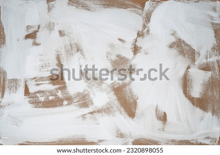 The texture of the plaster on the wall, rough strokes made with a palette knife, paint on the surface, abstract background for design Royalty-Free Stock Photo #2320898055