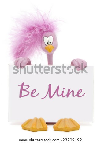 Pink ceramic cartoon-style bird with a fluffy feather on his head holding a 'Be Mine' sign. Easy to change the text and customize the image!