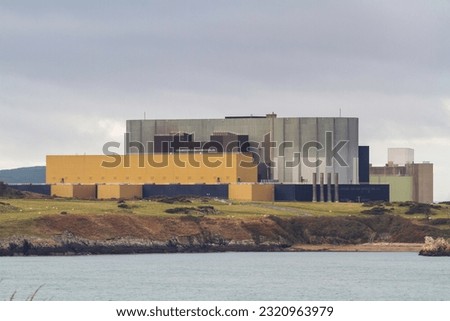 Wylfa Nuclear Power Station on the north Anglesey Coast, North Wales, UK, telephoto. Royalty-Free Stock Photo #2320963979