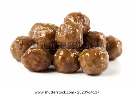 Swedish Meatballs with brown Swedish sauce, isolated in white, delicious and tasty Royalty-Free Stock Photo #2320964117