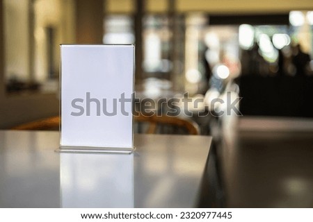 Stand Mock up Menu frame tent card blurred background design key visual layout in cafe