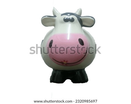
Plaster molded into a piggy bank in the shape of a cow