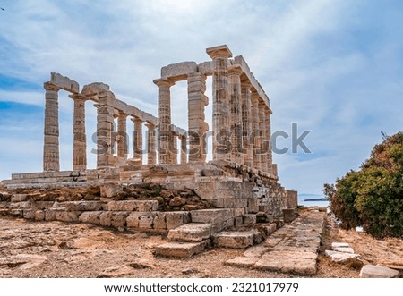 The Temple of Poseidon, ancient ruined Greek marble temple, on the mountain top under blue sky Royalty-Free Stock Photo #2321017979