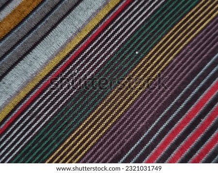 Lurik is the name of a traditional cloth
originating from the area of Java, the word lurik itself comes from the Javanese language, lorek which means lines, which is a symbol of simplicity