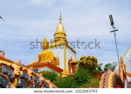 Gold buddha with white pagoda, attractions in Chiang Mai, Thailand