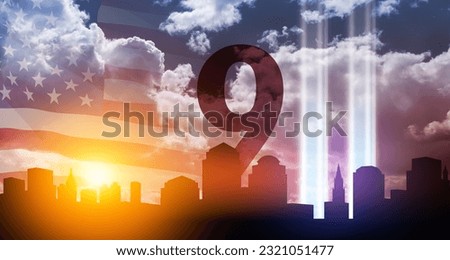 September 11 Tribute In Light Art Installation in the Lower Manhattan New York City Skyline at Sunset with USA flag and birds flying up like souls. 9.11 date concept. American Patriot Day banner. Royalty-Free Stock Photo #2321051477