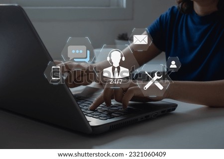 Technical Support Center Customer Service Internet Business Technology Concept. online technical support, and customer service 24-7 nonstop. Business people using laptop with helpdesk icon on screen. Royalty-Free Stock Photo #2321060409