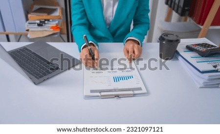 Excited Asian bookkeepers doing bookkeeping, accounts payable, assets, book value, equity, inventory, liabilities, cost of goods sold, depreciation, expenses, Gross profit, diversification, liquidity Royalty-Free Stock Photo #2321097121