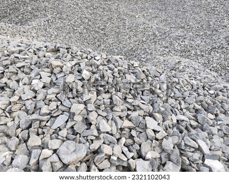 Very cool gray and black pebbles or broken stone background