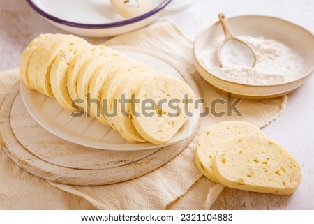 Bavarian bread dumplings served on plate, Czech bread dumplings (German name is Serviettenknoedel)