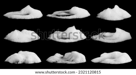 liquid white foam from soap or shampoo or shower gel Abstract soap bubbles. Set foam, soap bubble isolated on black, with clipping path texture and background.	
 Royalty-Free Stock Photo #2321120815