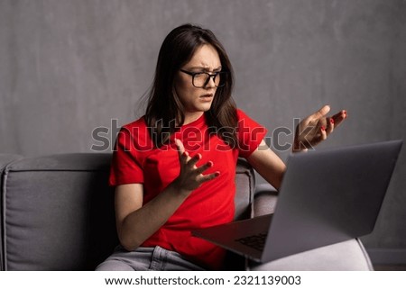 Stressed upset shocked girl worried about problem, negative message, dismissal notification or debt Royalty-Free Stock Photo #2321139003