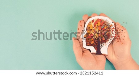 Alzheimer awareness day, dementia diagnosis, Parkinson´s disease, memory loss disorder, brain with autumn foliage Royalty-Free Stock Photo #2321152411