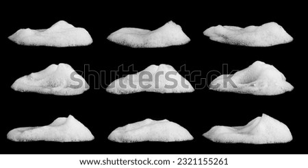 liquid white foam from soap or shampoo or shower gel Abstract soap bubbles. Set foam, soap bubble isolated on black, with clipping path texture and background.	
 Royalty-Free Stock Photo #2321155261