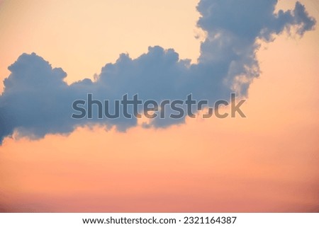 Wallpaper, blue clouds in the orange sky at sunset