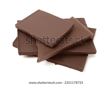 Pieces of tasty dark chocolate bar on isolated white