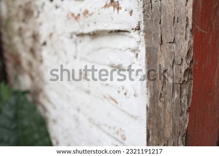 Texture of aged wood and white brick