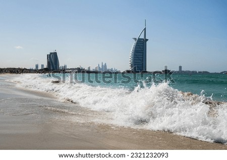View from the beach Jumeira on famous Seven Star Hotel Burj Al Arab in Dubai, United Arab Emirates Royalty-Free Stock Photo #2321232093